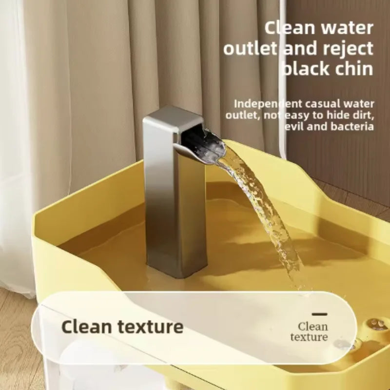 Close-up of clean flowing water spout on yellow cat water fountain - Wild Indoors Pet